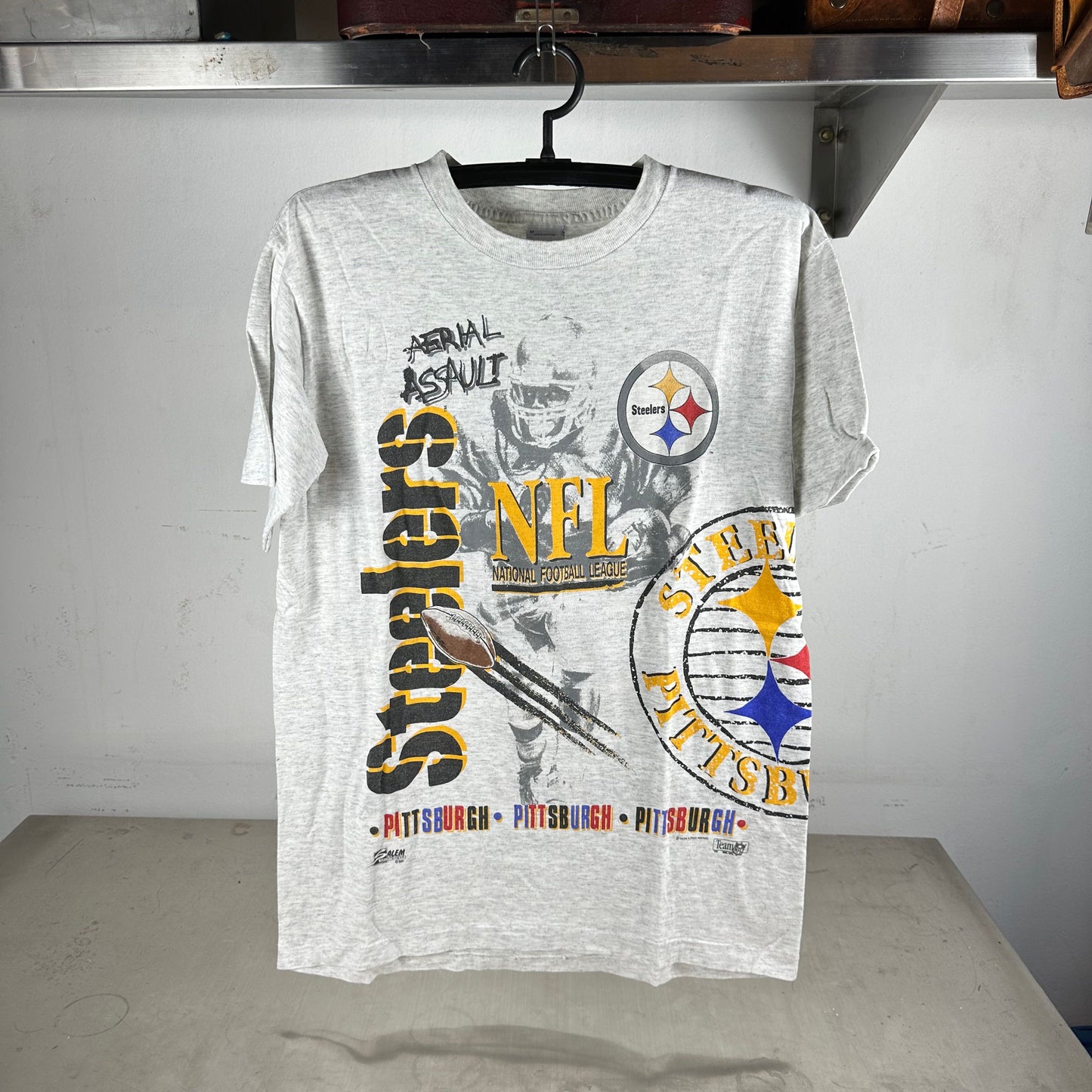 Vintage 1990 Pittsburgh Steelers NFL Aerial Assault AOP Salem Sportswear T-shirt