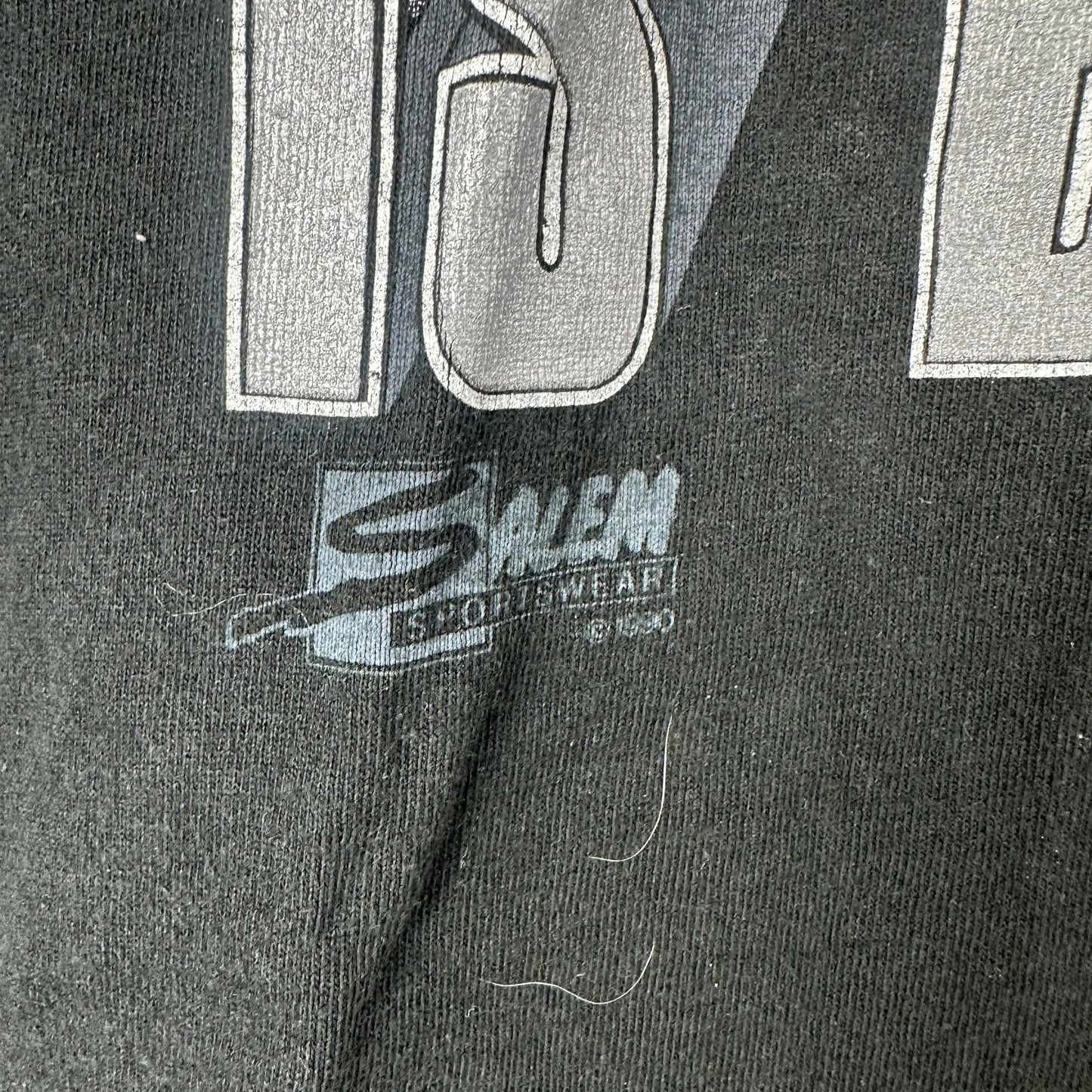 Vintage 1990 Oakland Raiders NFL The Silver &amp; Black is Back! T-shirt